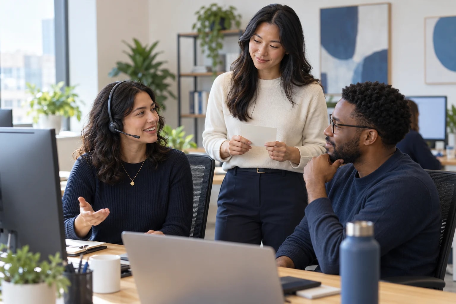 AI-generated editorial illustration of three support professionals coordinating a shift handoff; not Lendware employees or offices.